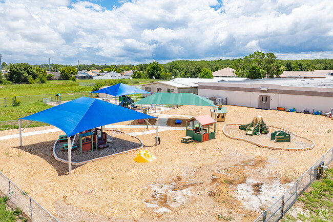 Kids enjoy playing on the play area at Fox Hollow Elementary.