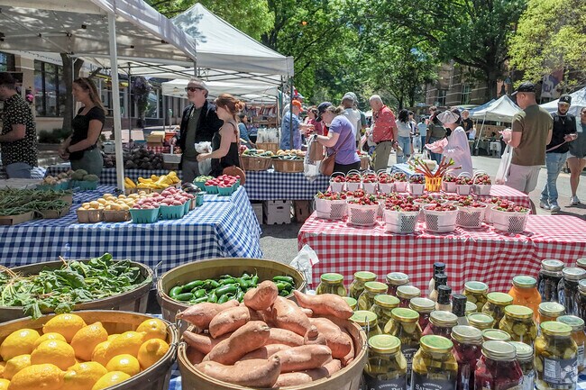 Fresh fruits and vegetables are popular on Saturdays at Soda City Market on Main Street.