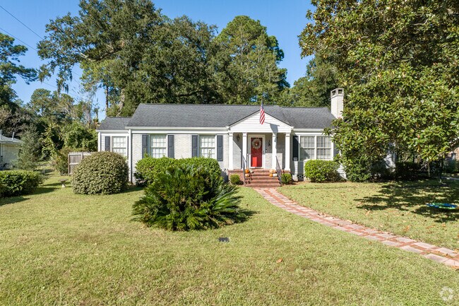 Ranch style homes reside on lots with simple landscaping.