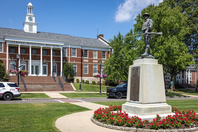 Verona’s Municipal Building anchors a civic plaza that hosts seasonal events and memorials.