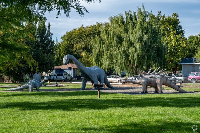 Hisey Park features dinosaur statues, walking trails, and family fun.