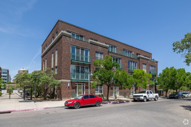 Brick and glass architecture define this corner condominium in Broadway Central Corridor near downtown.