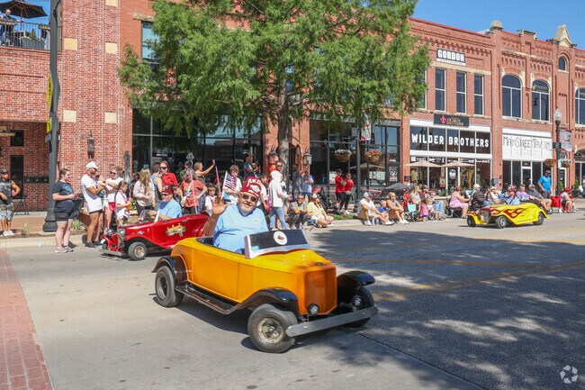 Akdar Shrine of Tulsa brings the fun and thrill with their mini cars at the Rooster Days Parade.