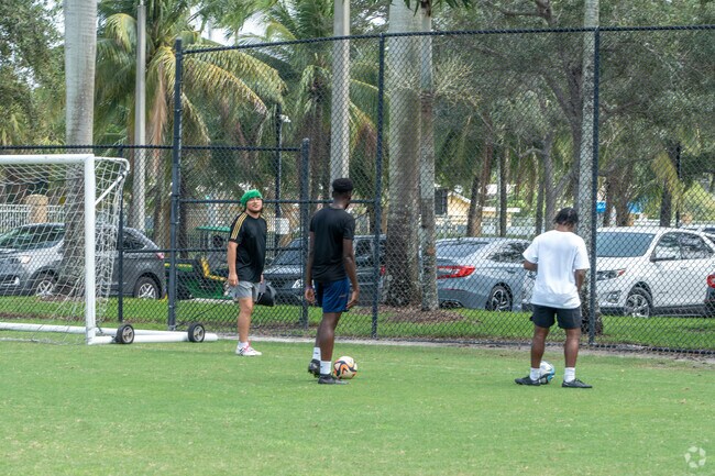 People playing soccer at Piper High School in Lauderhill, FL.