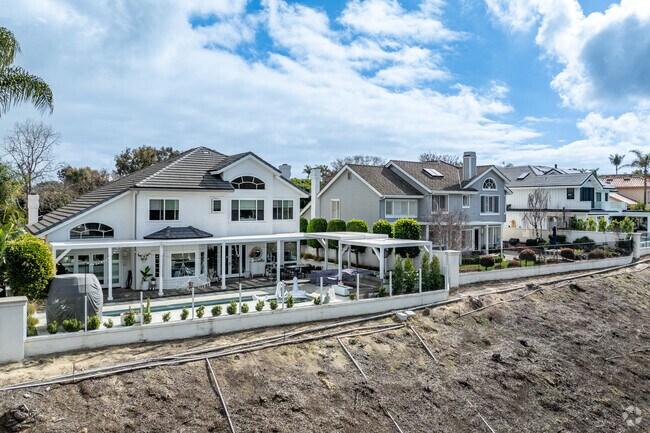 Traditional homes along the hillside have stunning views in Crest de Ville.