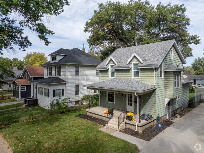 Unique houses line Neighbors Who Care, giving the area a vibrant, eclectic feel.