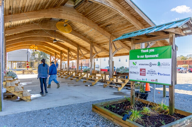 Franklin Farmers Market bustles with locals exploring fresh produce and artisanal goods.