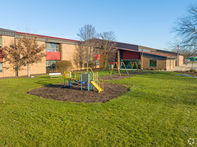 Students enjoy their playtime out on the playground.