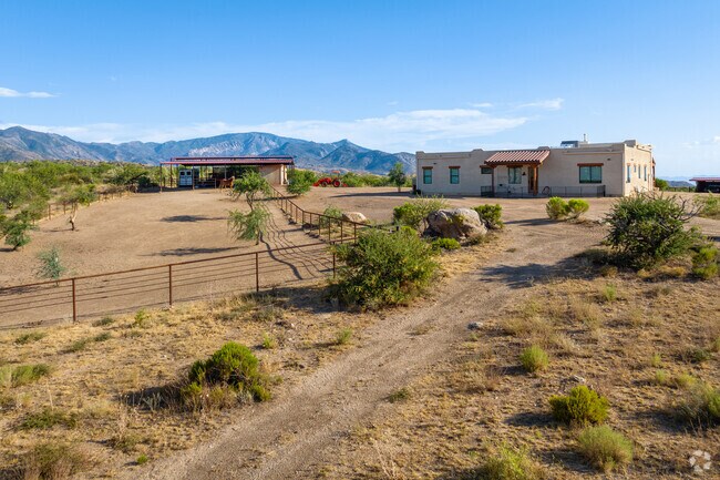 Explore Oracle, Arizona's countryside with its sprawling horse estates.