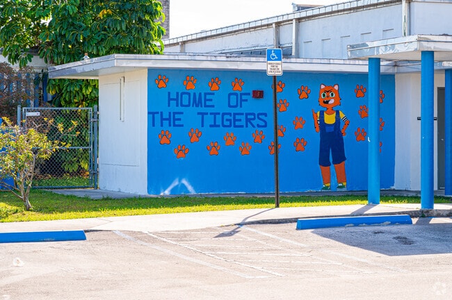 An accessible entrance welcomes staff and students at Madie Ives K-8 Preparatory Academy.
