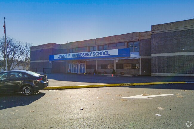 Students in grades Pre-K through 2 may attend James F. Hennessey School.