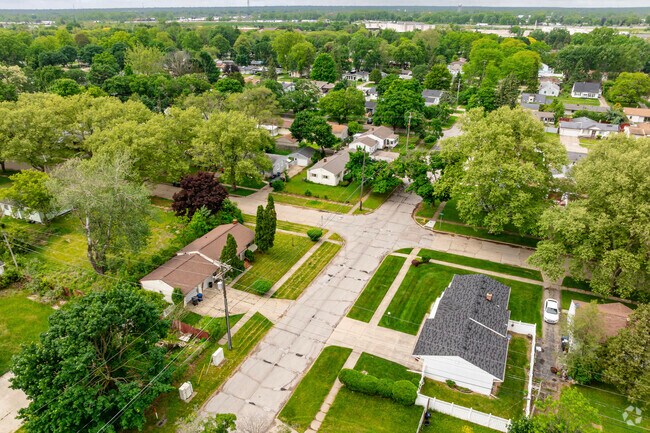 Criss-crossed streets in Evergreen Valley are bordered on both sides by well-maintained sidewalks.