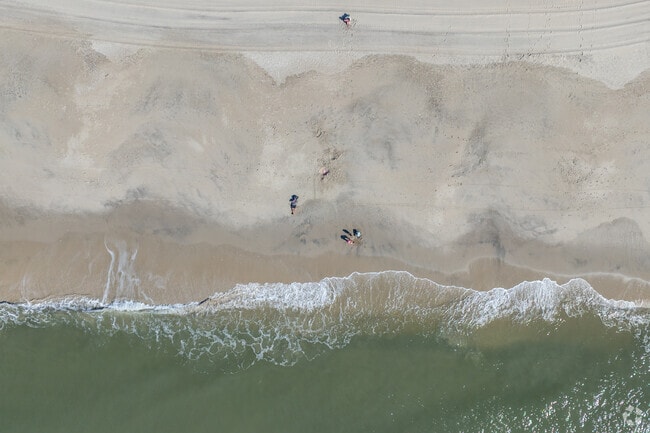 Residents sit on Cape May's peaceful beaches during the summer months.