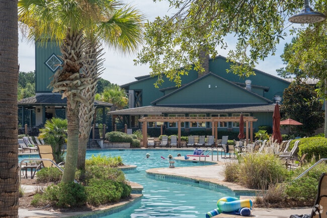 Hampton Lake features multiple community amenities inside the gates including a pool.