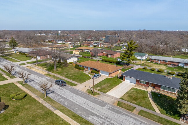 A row of single-story ranch-style homes in Tolleston.