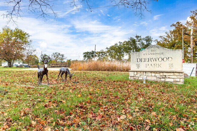 Deerwood Park in Evansdale features deer sculptures and river access.