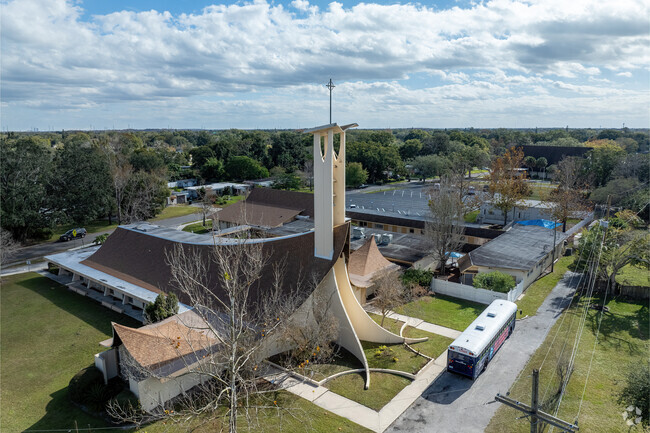 The church at Little Steps Academy is characterized by noticeable curved features.