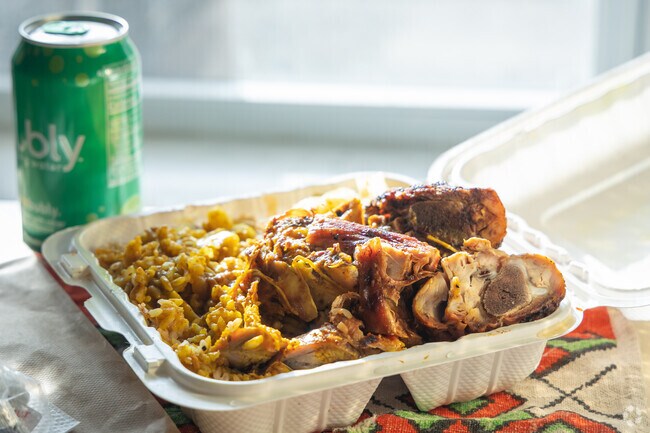 Jerk chicken takes you on a journey to the islands at Blue Caribbean Bar & Lounge near Arlington