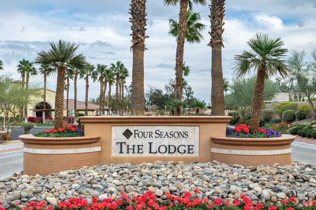 The Lodge features a pool, courts, and fitness center for Four Seasons residents.
