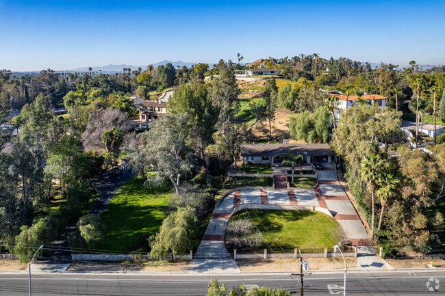 There are homes amongst the hills in Victoria.