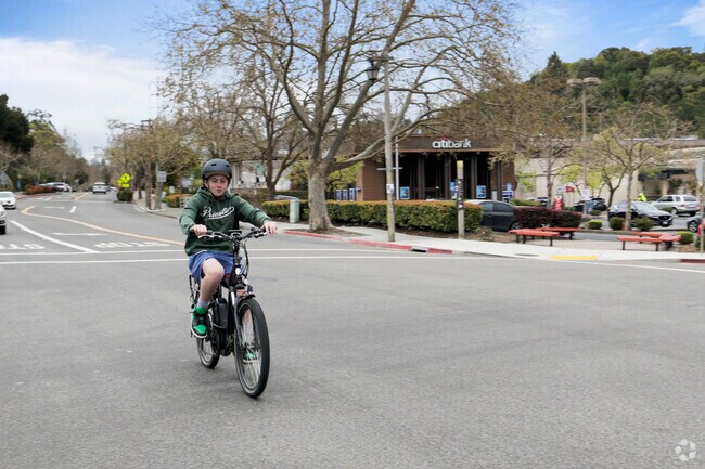 People enjoy bike rides through the Orinda Village.