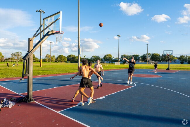 Enjoy a beautiful afternoon with friends while playing at the Sunset Lakes Community Center.