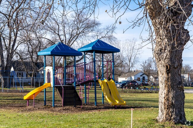 Children will enjoy playing for hours on the playground at Harrison Pointe Park.