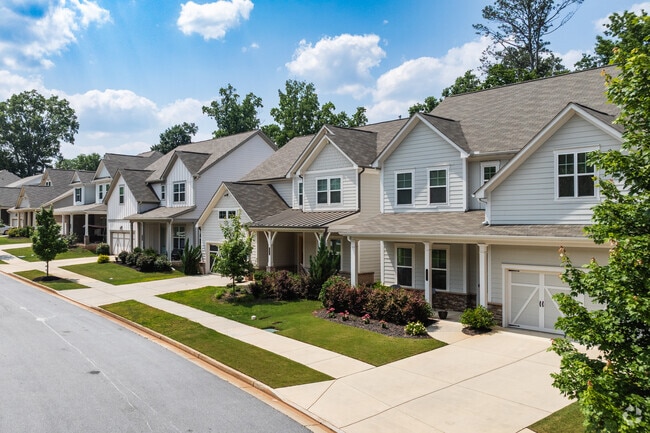 Lindmoor Woods–Valley Brook Estates offers charming single-family homes with lush lawns and welcoming porches, ideal for first-time buyers and families alike.