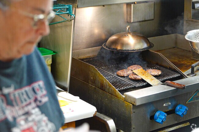 The Village Bar in Bellevue serves up homemade burgers along with other meals.