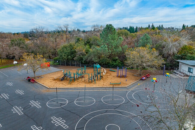 Children love the play structure at Oakhills Elementary School.