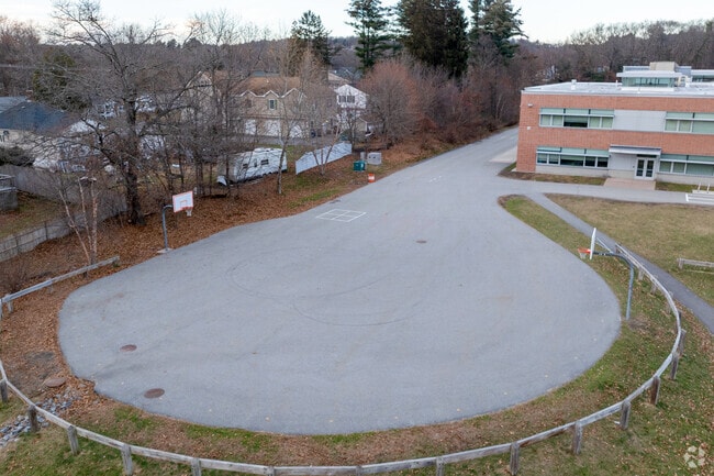 David J. Quinn Middle School has a basketball hoop.
