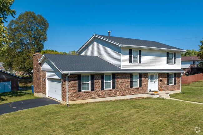 Forest Ridge Quail Hollow homes often include convenient attached garages.