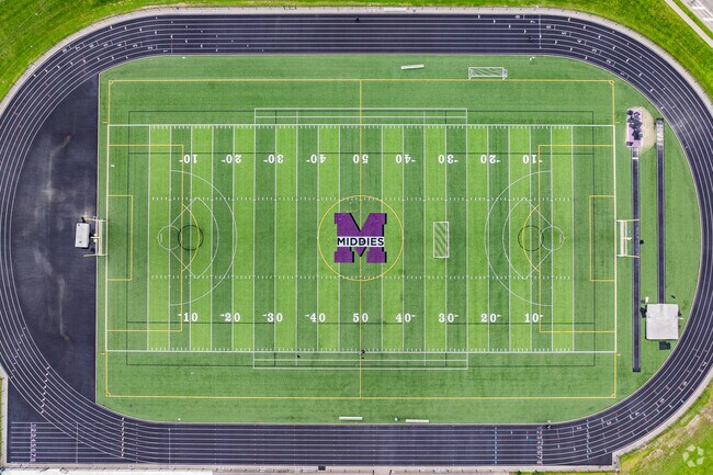 Douglass residents root the Middies at Middletown High School.