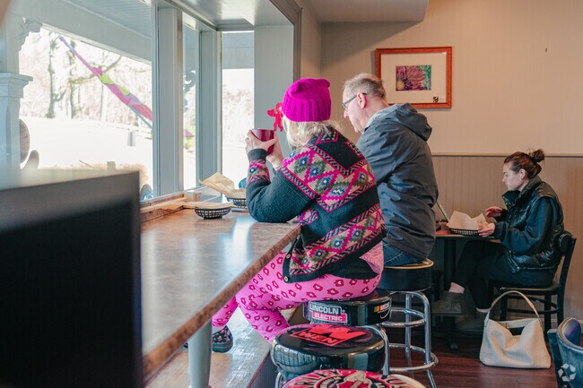 Residents of Fiskdale enjoy a warm drink at Sturbridge Coffee House.