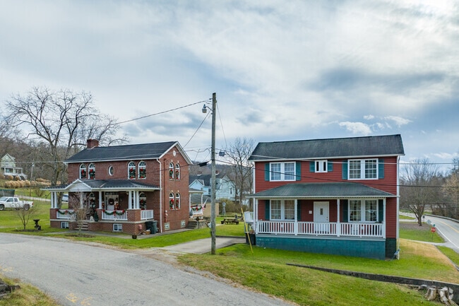 A row of larger homes on a narrow side street in the neighborhood of Nicholson Township.