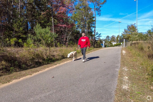 Enjoy the beauty of nature with your best friend on the greenways in Morrisville.