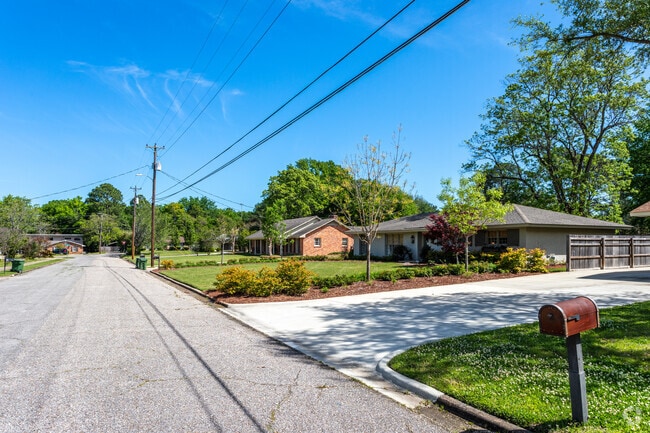Hillwood street features homes with spacious driveways for multiple vehicles.