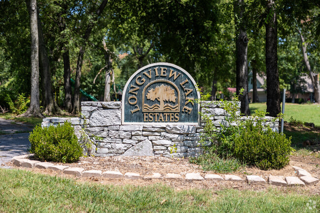The Longview Lake Estates sign welcomes residents and visitors into the neighborhood.