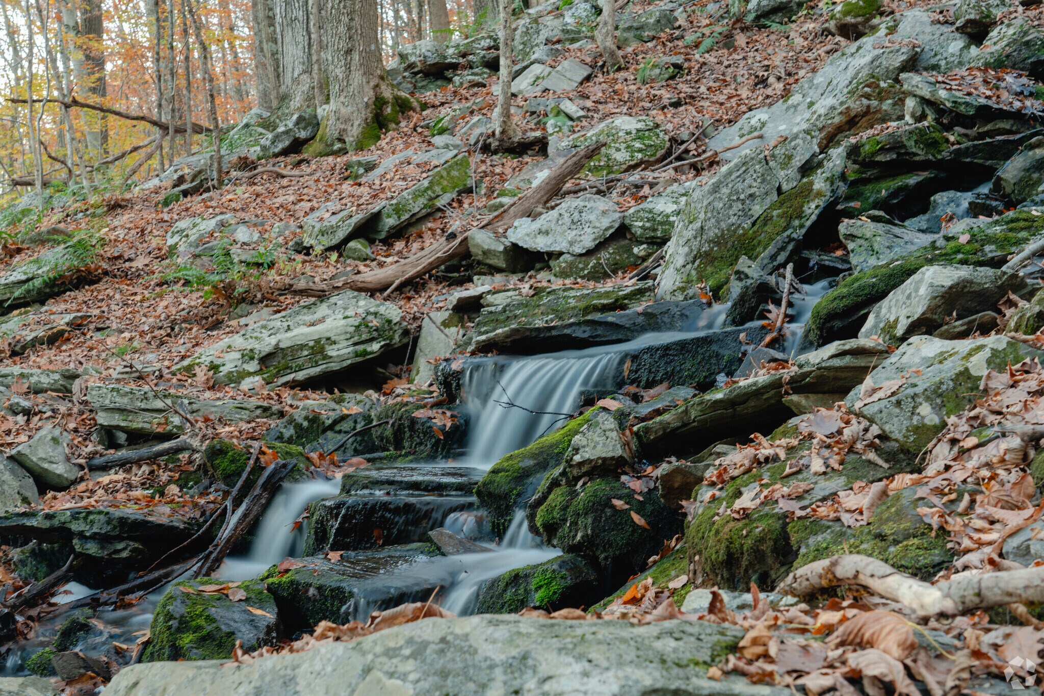 Walk along the hiking trail to get a better view of The Cascading Waters.
