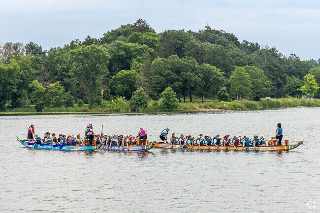 The Dragon Boats are large canoe-like vessels fitted with ornately carved dragon heads and tails and are raced at the Dragon Festival each year on Lake Phalen.