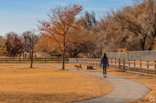Dogs can roam free at this spacious park, which has a walking path around the perimeter.