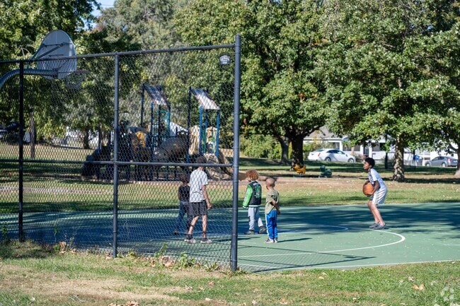Kids having fun playing basketball at Monroe Park near The Elms area.