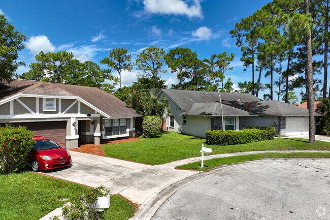 Peaceful residential area in Sugar Pond Manor neighborhood.