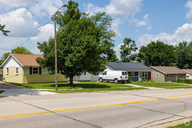 Kenwood Park residential streets are lined with large trees and well maintained lawns.