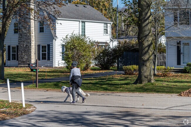 A Fox Point resident enjoying a fall walk.