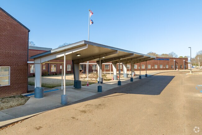 The covered awning at Senatobia Elementary School helps keep students dry on rainy days.