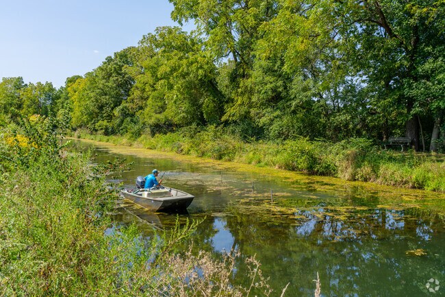 At the Union Canal Tunnel Park, fisherman take their boats along the canal to find a big catch.