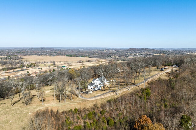 Farmland and winding back roads in Hopewell lead the way to residential homes.