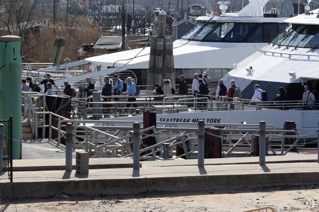 Patrons arrive from a pleasant trip from New York to the terminal in near Keansburg.