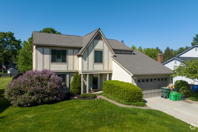 Well-kept Tudor-style homes line Olentangy High Bluffs in Columbus.